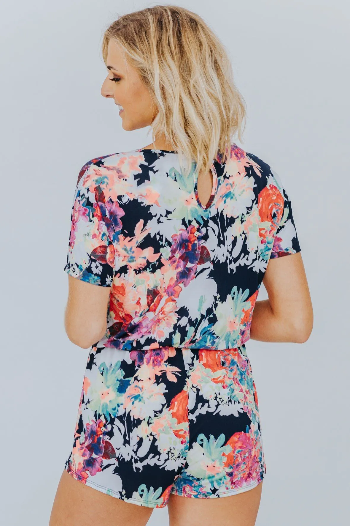 Break My Heart Short Sleeve Neon Floral Elastic Waist Romper in Black